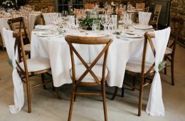 Rustic crossback chair and oatmeal seat pads